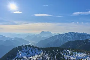 Category Mountain Landscapes Prints: Snow-covered mountains under a clear blue sky with bright sunshine
