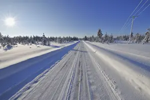 Snow covered road in winter, Kuloharju