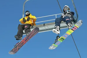 Snowboarders on a ski lift, Canada Olympic Park
