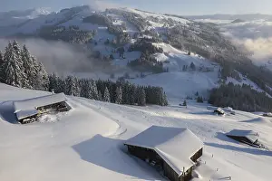 Snowy mountain huts in winter, SkiWelt Wilder Kaiser