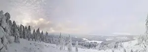 Snowy mountain panorama with wide views