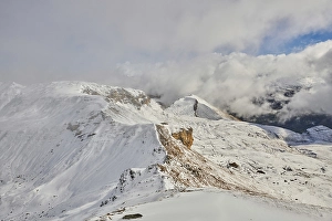 Snowy Mountains with clouds at Hochalpenstrasse
