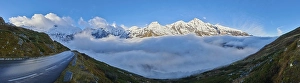 Snowy Mountains above the clouds at Hochalpenstrasse