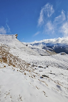 Snowy Mountains with clouds at Hochalpenstrasse