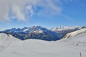 Category Mountain Landscapes Prints: Snowy Mountains with clouds at Hochalpenstrasse