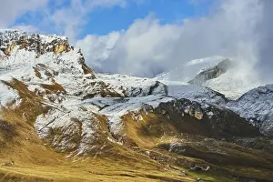 Snowy Mountains with clouds at Hochalpenstrasse
