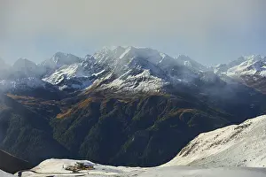 Snowy Mountains with clouds at Hochalpenstrasse