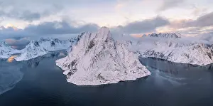 Snowy mountains by the fjord, Mount Olstinden