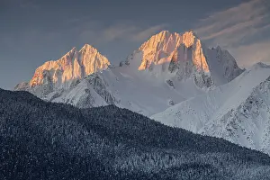 Snowy mountains and peaks in the morning light