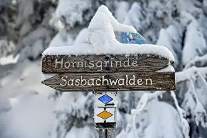 Snowy signpost near the Hornisgrinde