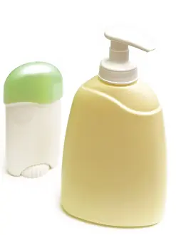Soap and deodorant over the white background