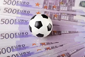 Soccer ball on background of euro banknotes