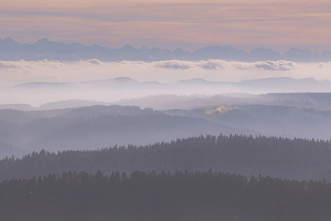 Category Mountain Landscapes Prints: Soft colours over mist-covered mountain ranges at dusk