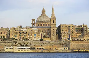 Soft evening light on buildings and churches Valletta