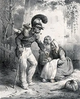 A soldier bends down to put some money into the hand of an old lady sitting by the side of the road