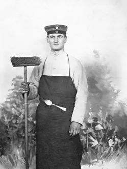 Soldier with broom and spoon, kitchen service