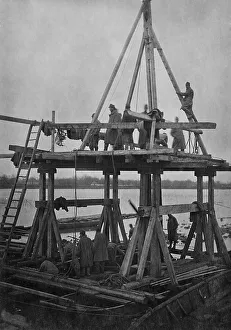 Soldiers building a bridge, historic photograph