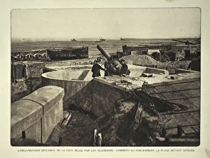 Soldiers with cannon at German fortification and bunkers on the beach at Ostend in Flanders during the First World War