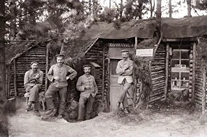 Four soldiers in front of the canteen in the winter quarter