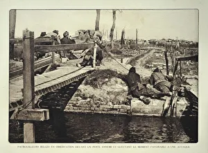 Soldiers on reconnaissance patrol observing the enemy from bridge in Flanders during the First World War