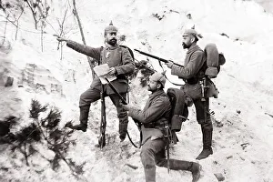 Four soldiers on terrain, reconnaissance. Vanguard