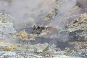 Solfatara field with hot pools and boiling mud at Seltun