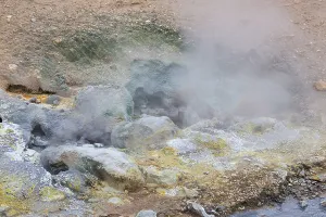 Solfatara field with hot pools and boiling mud at Seltun