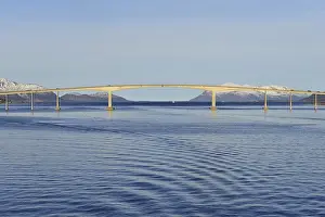 Sortland Bridge over wavy blue waters of Sortlandssundet strait