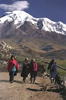 South American Indians in front of Mount Chimborazo