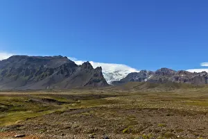 South Icelandic mountain landscape under a bright blue summer sky