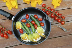 Southern German cuisine, stuffed courgette flowers sauteed in pan