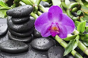 Framed Print : Spa concept with black basalt massage stones