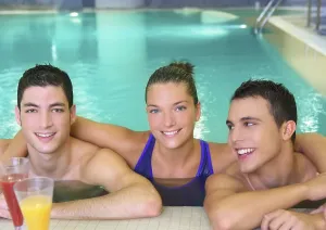 Category Historic EN Prints: Spa young friends group smiling in turquoise pool water