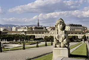 Sphinx in Belvedere garden with view to the castle