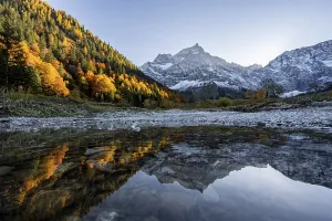 Spitzkarspitze in autumn, reflected in water