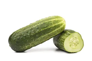 Split of cucumber isolated on a white background