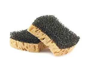 Two sponges isolated on white background