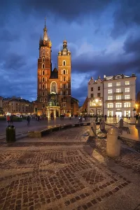 St. Mary Basilica and Old Town Main Square at night in city of Krakow