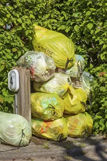 Stacked yellow bags for plastic waste, Germany