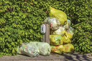 Stacked yellow bags for plastic waste, Germany