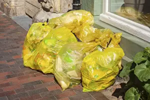 Stacked yellow bags for plastic waste, Germany