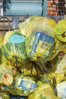 Stacked yellow bags for plastic waste, Germany