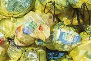 Stacked yellow bags for plastic waste, Germany