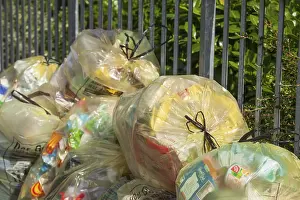 Stacked yellow bags for plastic waste, Germany