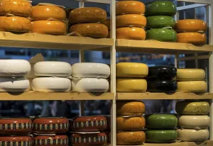 Stall with cheese wheels, Market Hall