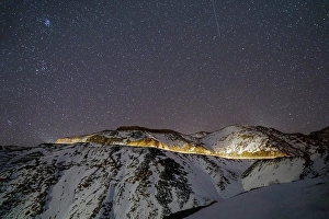 Category Mountain Landscapes Prints: Starry sky over snowy mountains