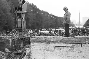 The start of the demolition of the Berlin Wall at the Brandenburg Gate