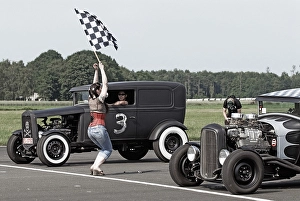 Starter girl starting a hot rod race