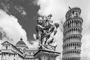 Statue with angels, behind the Cathedral of Santa Maria Assunta and the Leaning Tower