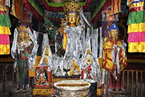 Statue of Buddha Sakyamuni in a temple Samye Monastery Tibet China
